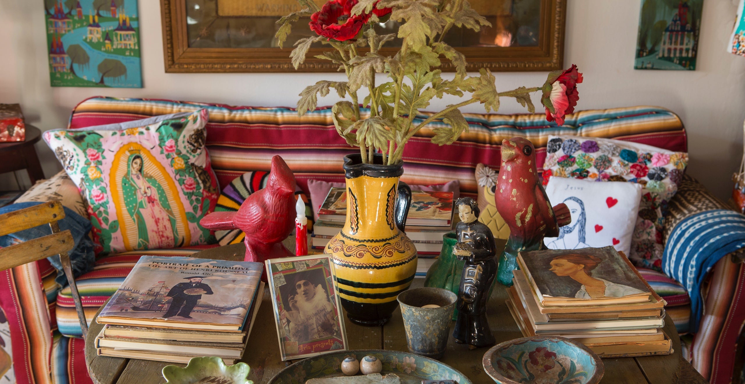 In the author&rsquo;s New York City apartment, an eclectic tabletop exhibit of beloved flea market finds, souvenirs of travel, and gifts from friends