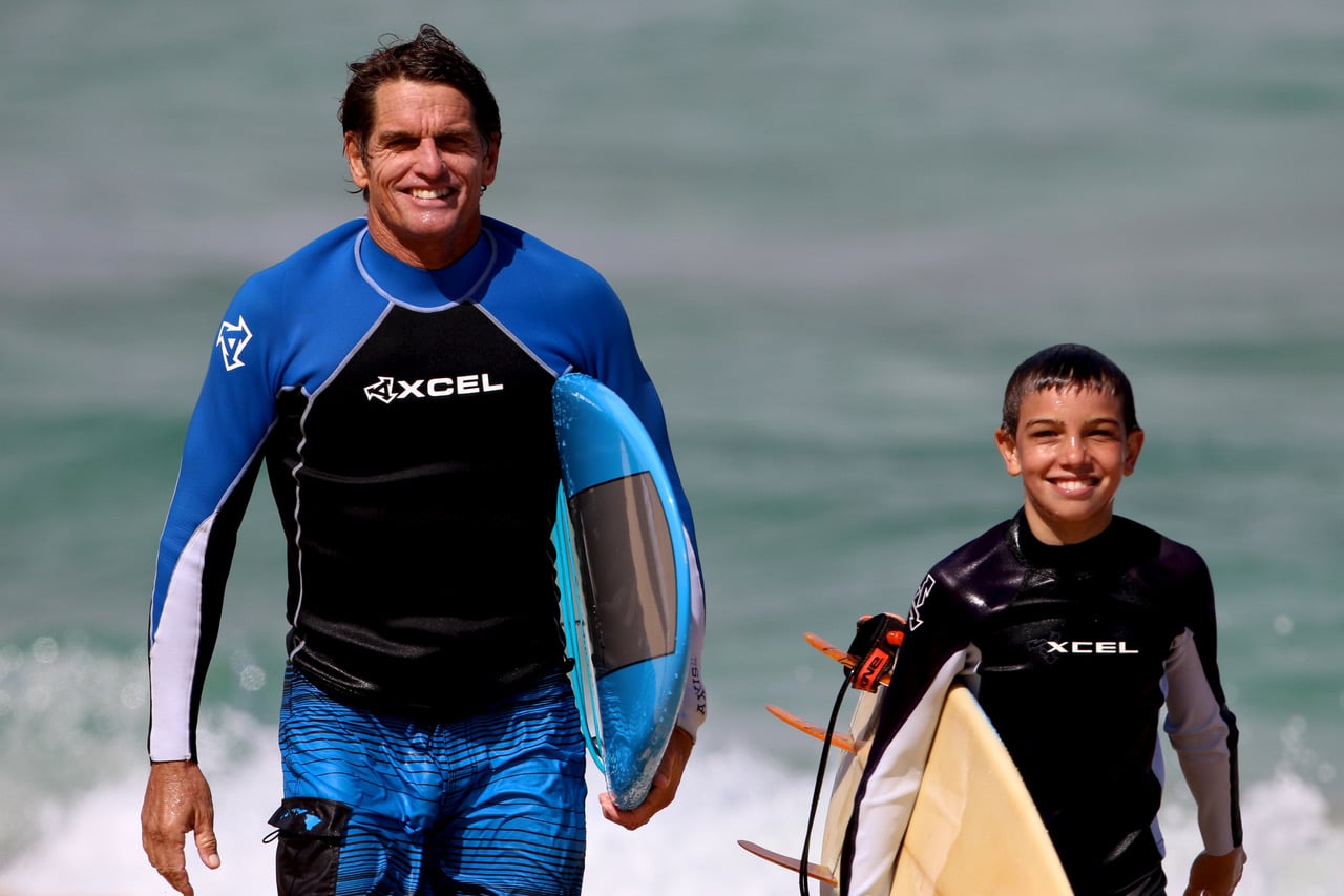 Kerbox with his son Kyler on the beach at Laniakea on the North Shore of Oahu 