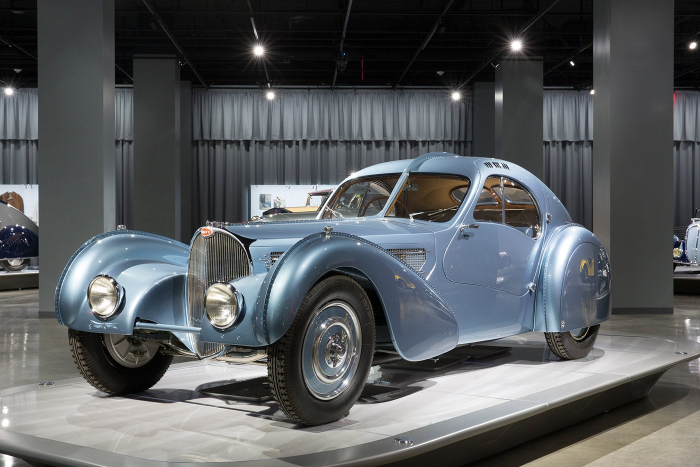 <rlmag_link articleid="time-machine">1936 Type 57SC Atlantic Bugatti Coupe</rlmag_link>: The Petersen has this sculptural piece in their ‘Artistry’ exhibit — Ralph Lauren owns the only other model on earth