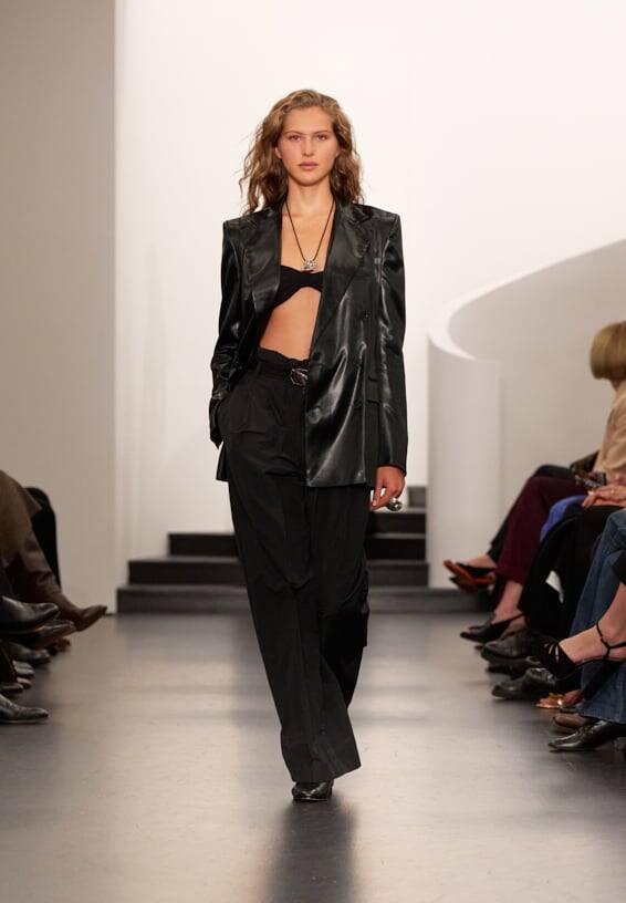 A look from Ralph Lauren’s Fall 2025 runway show shown on model.